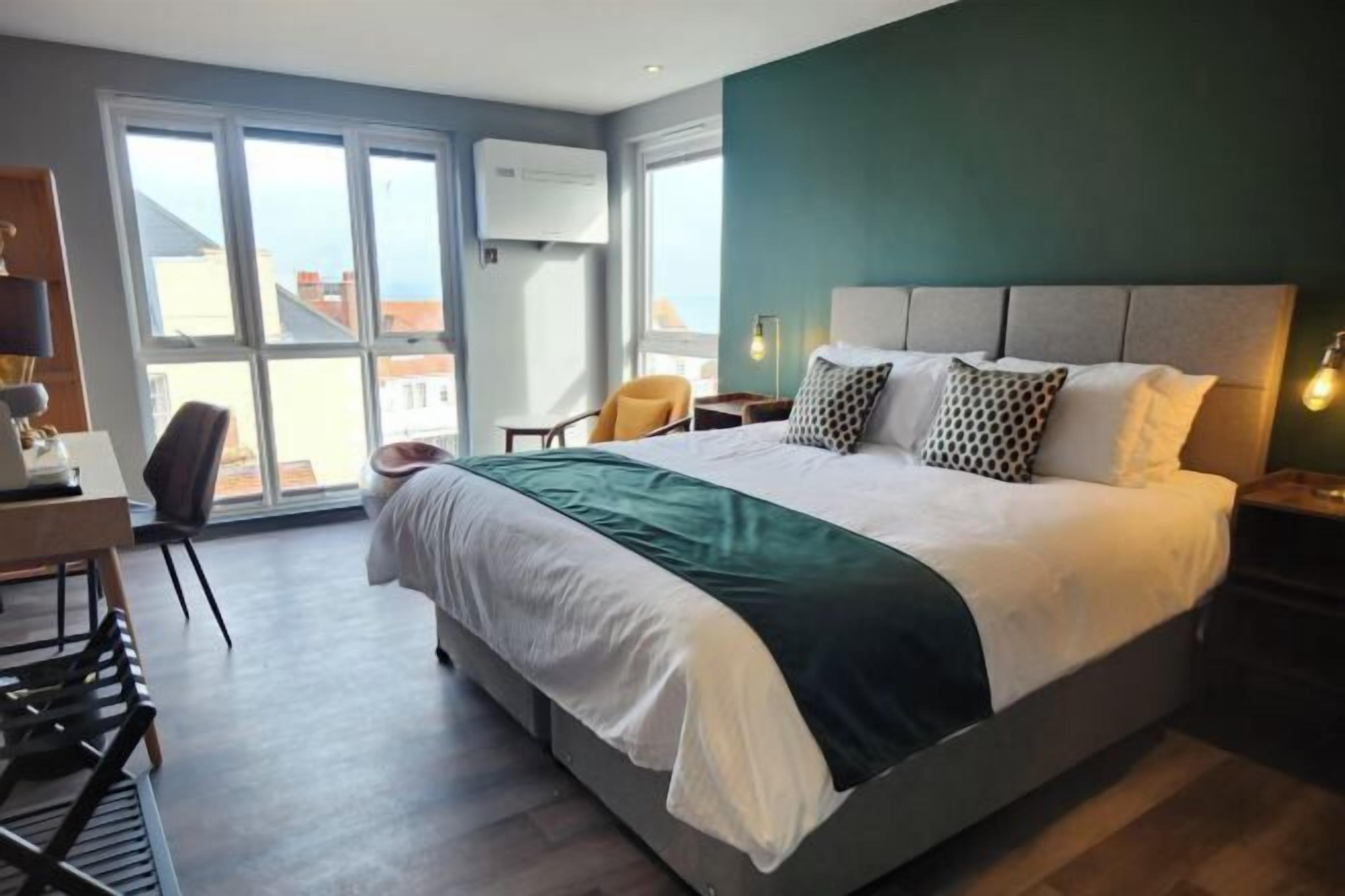 Premium bedding, Select Comfort beds, desk, laptop workspace