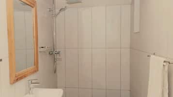 Shower, towels, toilet paper
