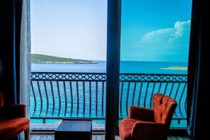 Habitación ejecutiva, 1 cama Queen size, vista al mar | Sábanas de algodón egipcio y ropa de cama de alta calidad 