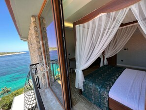 Habitación doble Elite, 1 cama Queen size, para no fumadores, vista parcial al mar | Sábanas de algodón egipcio y ropa de cama de alta calidad 