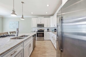 Fridge, microwave, oven, stovetop - Anchor Down Luxury Ocean View Beach House w Pool (North Myrtle Beach)