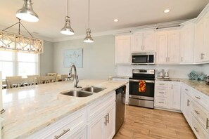 Fridge, microwave, oven, stovetop - Anchor Down Luxury Ocean View Beach House w Pool (North Myrtle Beach)