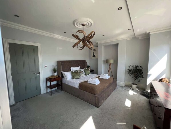 4 bedrooms, iron/ironing board, travel cot, WiFi