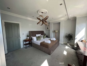 4 bedrooms, iron/ironing board, travel cot, WiFi