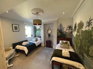 4 bedrooms, iron/ironing board, travel cot, WiFi