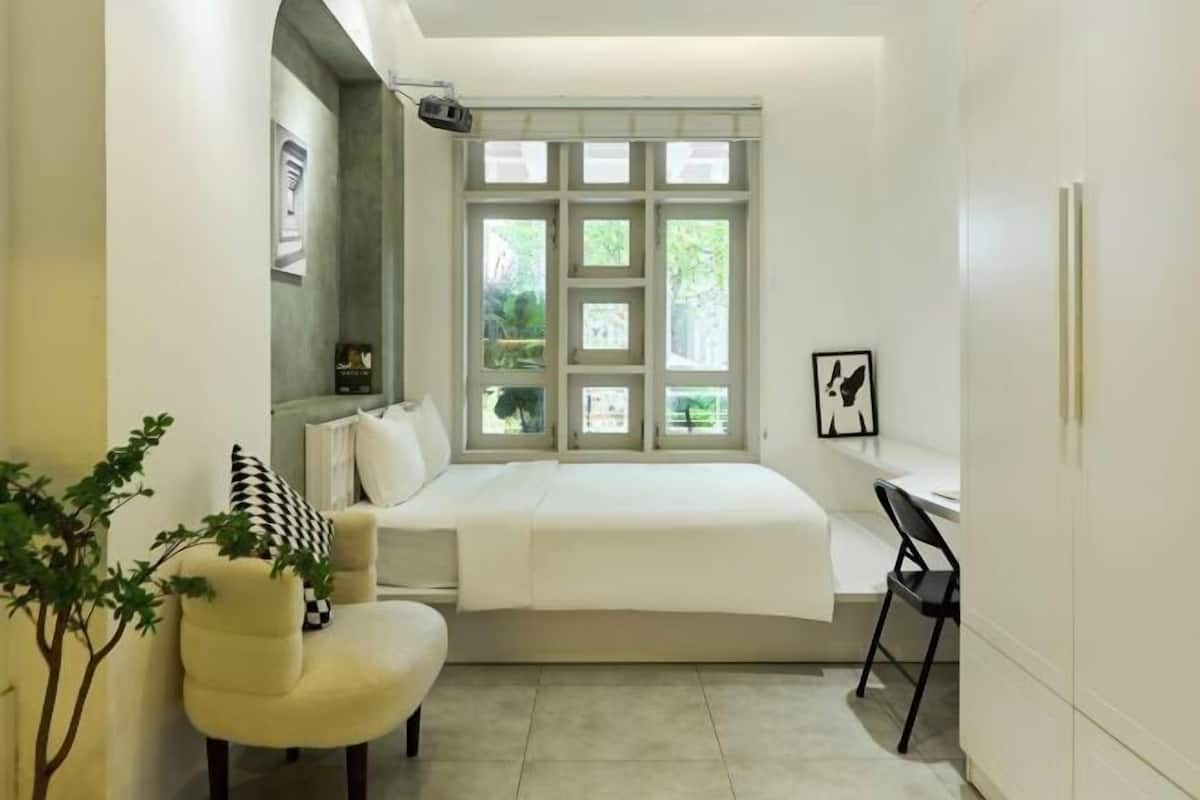 Minibar, desk, laptop workspace, iron/ironing board