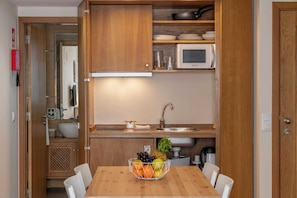 Basic Studio, 2 Twin Beds | Private kitchen | Fridge, microwave, stovetop, electric kettle