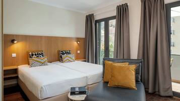 Basic Studio, 2 Twin Beds | 3 bedrooms, desk, laptop workspace, iron/ironing board