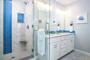 Bathtub, hair dryer, towels, soap