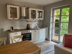 Fridge, microwave, oven, stovetop - Gemütliches und Modernes Ferienhaus an der Ostsee für die Ganze Familie (Fiefbergen)