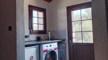 Mini-fridge, stovetop, cookware/dishes/utensils, spices