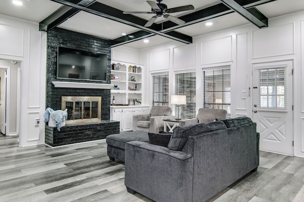 Smart TV, fireplace, table tennis, books