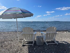 On the beach, sun loungers, beach towels