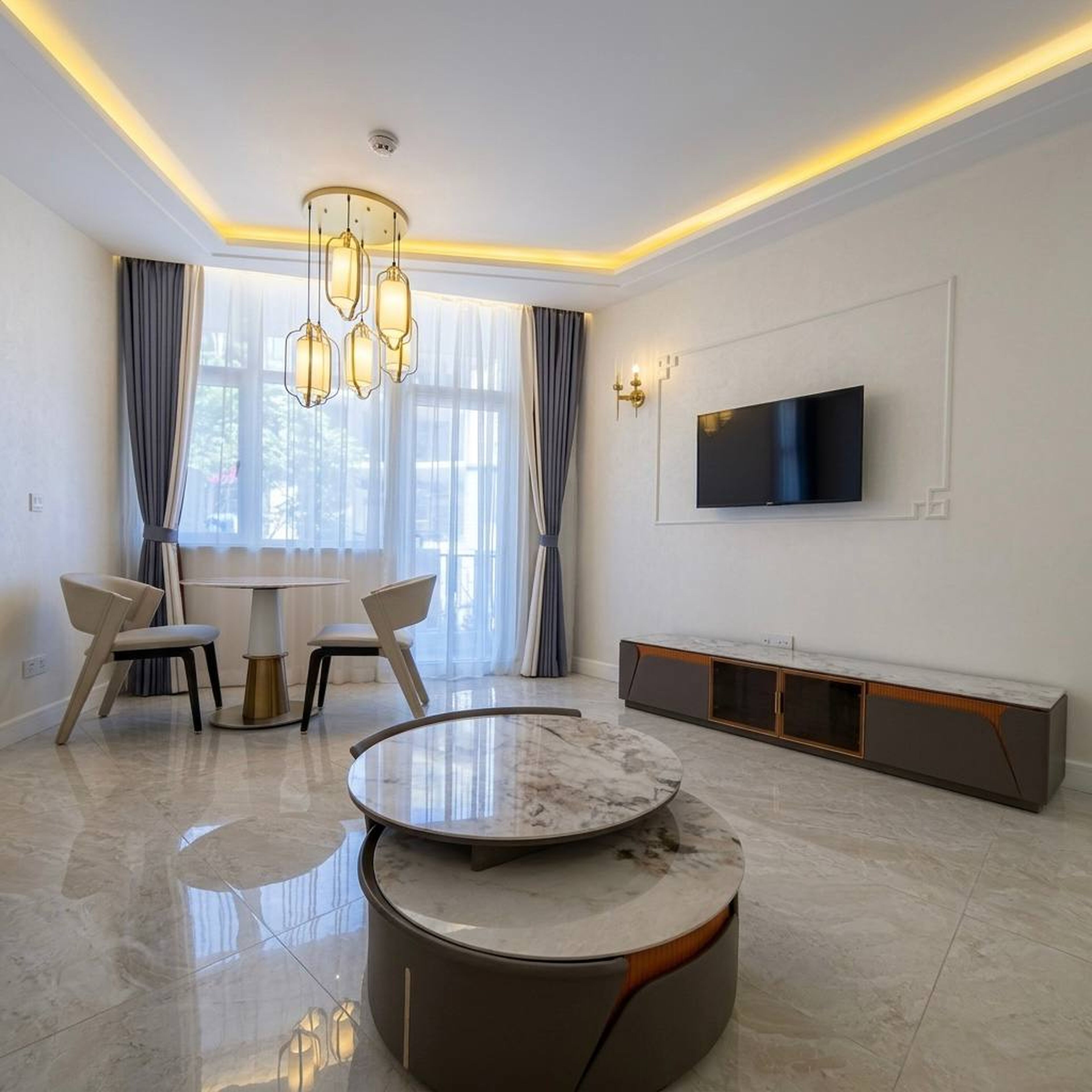 Appartement exécutif | Aire de séjour | Téléviseur connecté, films payants