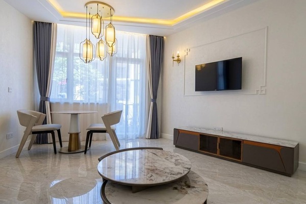 Apartamento ejecutivo | Zona de estar | Una Smart TV, películas de pago