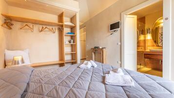 1 dormitorio, tabla de planchar con plancha, wifi gratis y ropa de cama