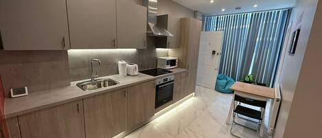 Apartment | Private kitchen | Fridge, microwave, oven, stovetop