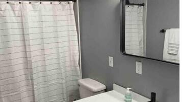 Shower, towels, soap, shampoo