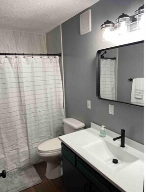 Shower, towels, soap, shampoo
