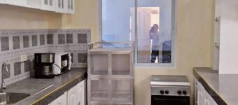 Rendon Place and Suites: Furnished 1-BR Apartment: 1st Flr in Great Location