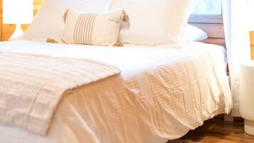 2 bedrooms, blackout curtains, iron/ironing board, bed sheets