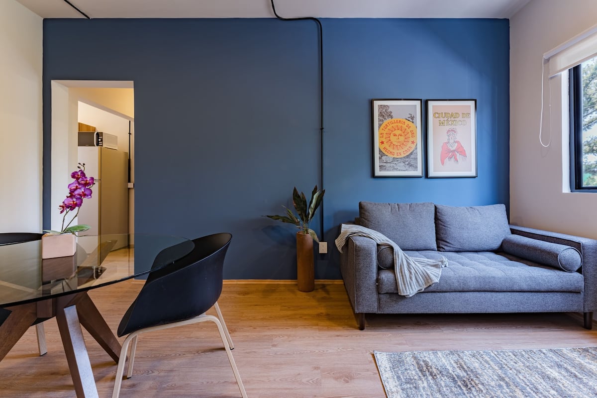 Suite, City View | Living area | Smart TV
