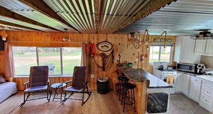 Rustic and charming two-bedroom home a block from the lake and park!