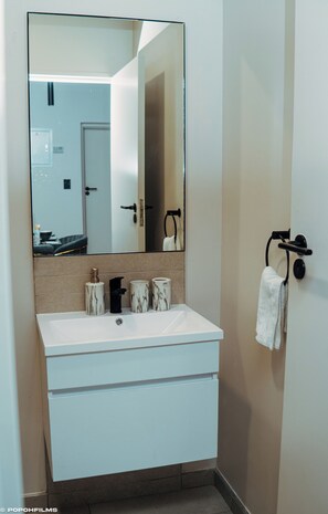 Hair dryer, towels, soap, shampoo