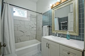 Hair dryer, towels, soap, toilet paper