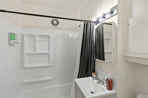 Hair dryer, towels, soap, shampoo