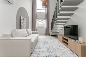 Quarto casal conforto | Área de estar