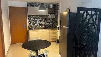 Apartment | Private kitchen | Full-size fridge, microwave, espresso maker, coffee/tea maker