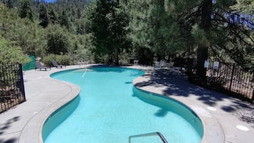 Seasonal outdoor pool, open 10:00 AM to 8:00 PM, sun loungers