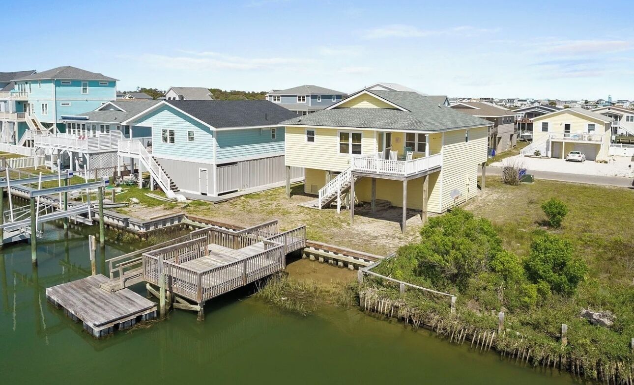 A canal access! Perfect cozy three-bedroom home just steps from beach access!