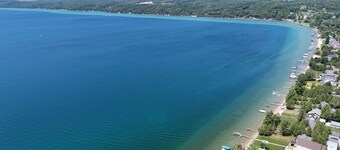 Lil's on the Lake - Vintage Cottage On Crystal Lake, Dog-Friendly, and Short Walk to Downtown Beulah!