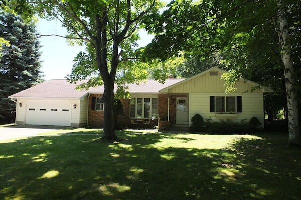 OVERVIEW:  The front of the house in summer