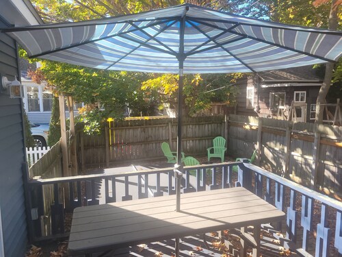 Restoration  - Romantic Getaway with Hot Tub, Deck, Fully Fenced-In Backyard, Bonfire Ring, Grill, A/C, and Great Location!  Also dog-friendly!