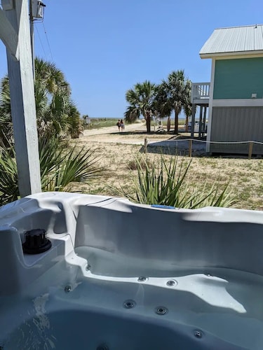 The Lucky Dog Beach House steps from the beach. 
