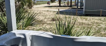 The Lucky Dog Beach House steps from the beach. 