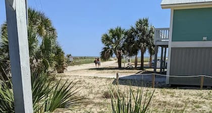 The Lucky Dog Beach House steps from the beach.