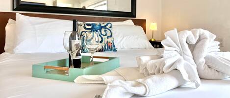 Tabla de planchar con plancha, wifi gratis y ropa de cama