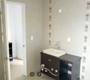 Shower, towels, soap, toilet paper