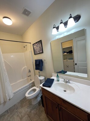 Hair dryer, towels, soap, shampoo