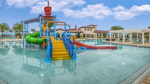 A water park with slides and a pool. - 8815 Macapa Drive (Kissimmee)