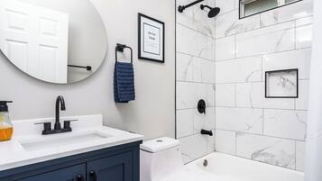 Hair dryer, towels, soap, shampoo