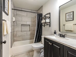 Hair dryer, towels, soap, shampoo