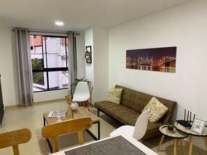 Standard Apartment, 1 Queen Bed with Sofa bed, Kitchen | Living area | 43-inch Smart TV with digital channels, heated floors - Praia Apartaestudios (Sabaneta)