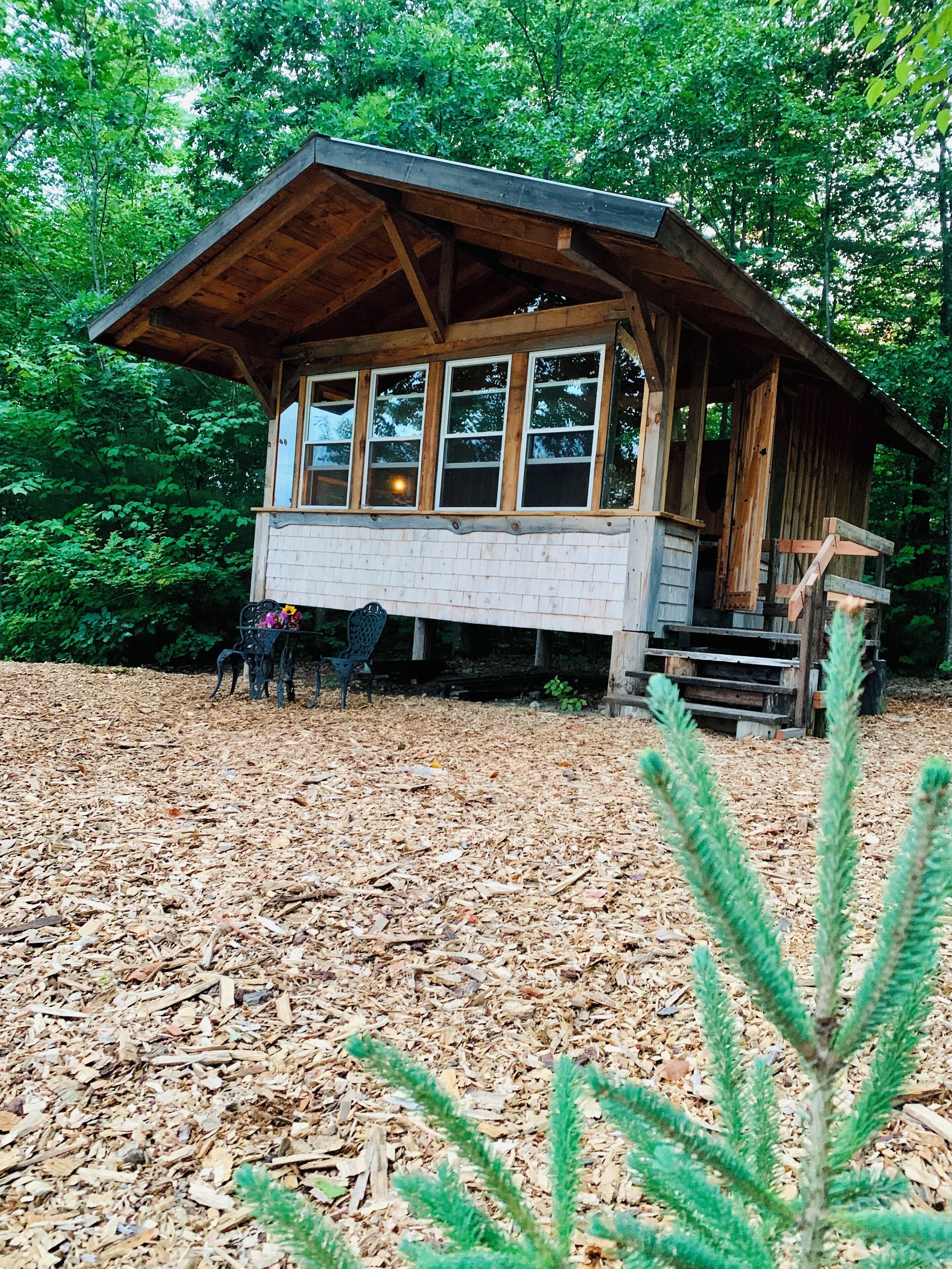 Handcrafted, off-grid, no electricity-rustic-lux camping cabin w/running water.