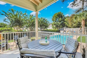 Outdoor dining - Houdini by the Sea! Heated Pool and Newly Landscaped Pool Area | Walk to Beaches and Village Area (Saint Simons Island)