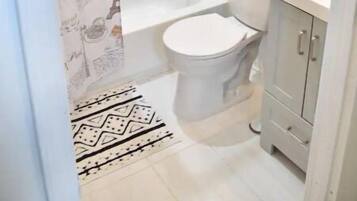 Hair dryer, towels, soap, shampoo